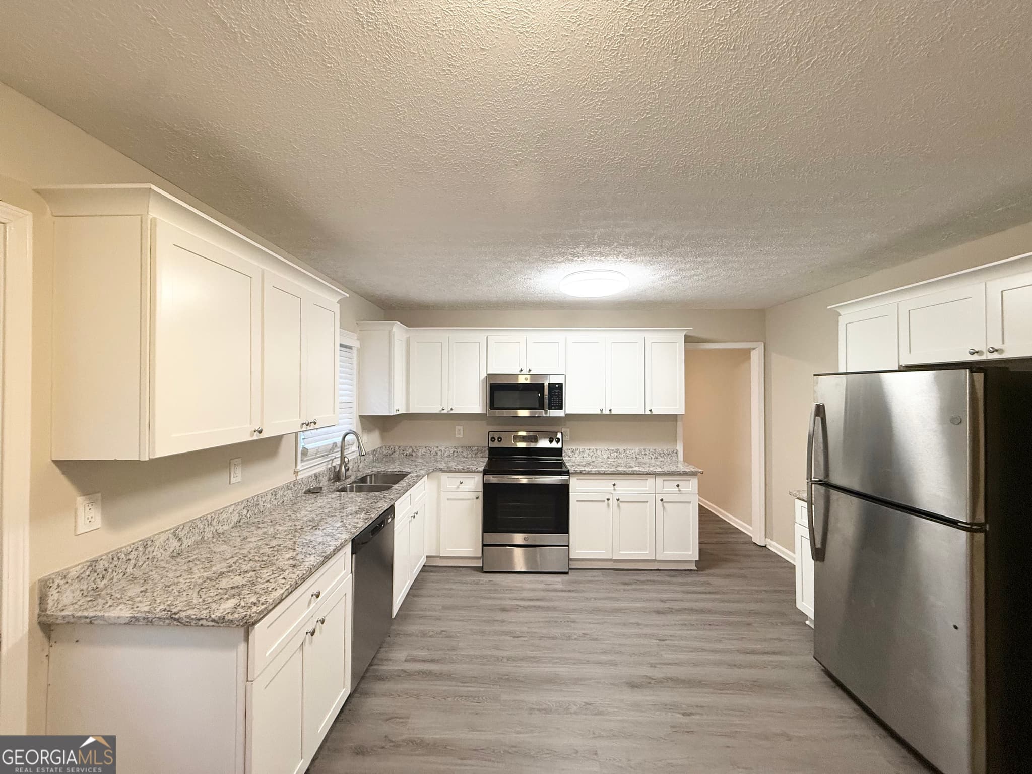 6 bedroom, 3.5 bathroom, 3,159 sq ft single family residence for sale at 1165 Huey Road, Douglasville, GA 30134 — photo 4