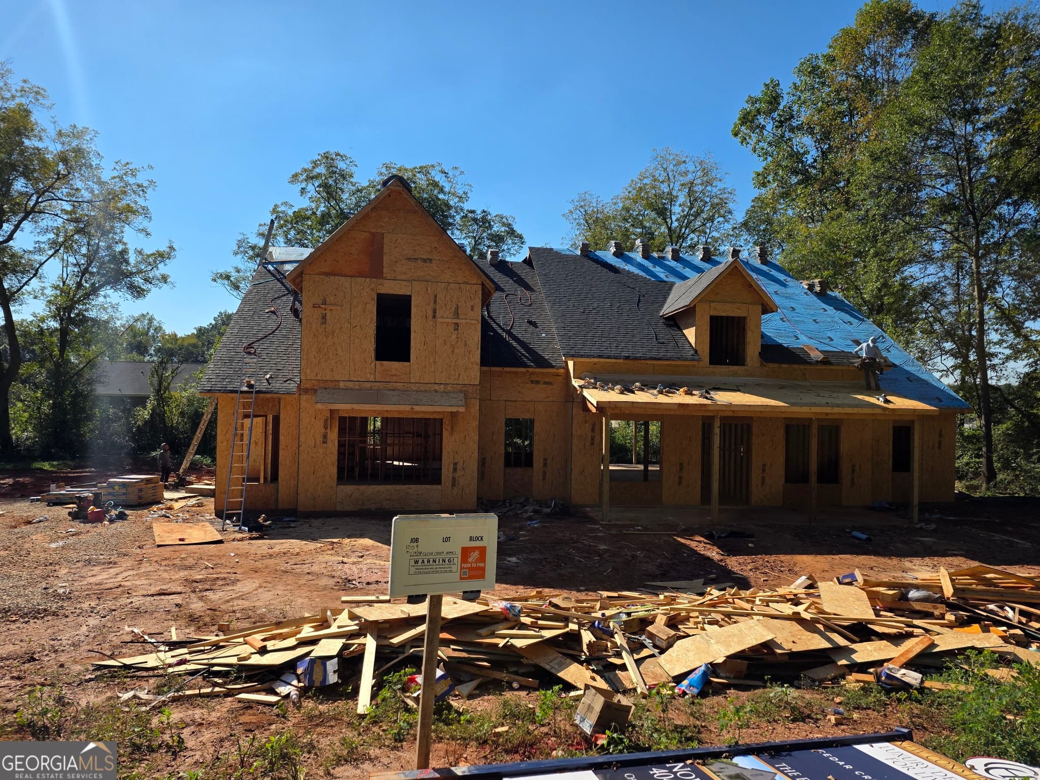 4 bedroom, 4.5 bathroom, 3,174 sq ft single family residence for sale at 1009 Moseley Road, Stockbridge, GA 30281 — photo 3
