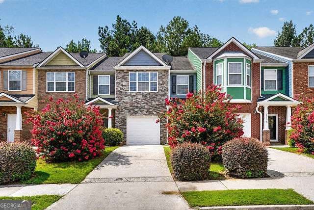 3 bedroom, 2.5 bathroom, 1,564 sq ft townhouse for rent at 2764 Haligan Point, Riverdale, GA 30296 for $1,900 a month — photo 1 of 24