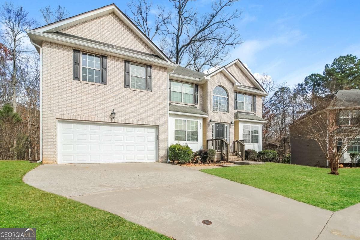 5 bedroom, 4 bathroom, 4,356 sq ft single family residence for sale at 4504 Warren Mill Trail, Ellenwood, GA 30294 — photo 3