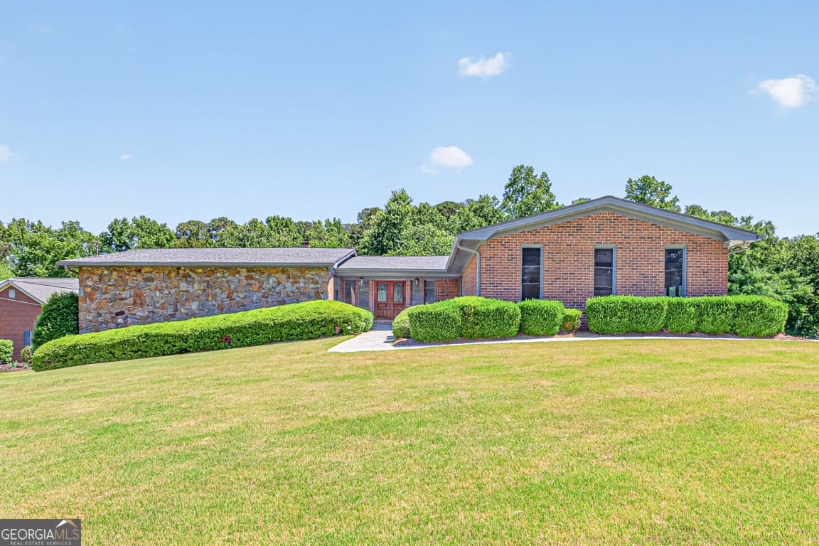 4 bedroom, 2.5 bathroom, 4,990 sq ft single family residence sold at 1728 Rivermist Drive, Lilburn, GA 30047