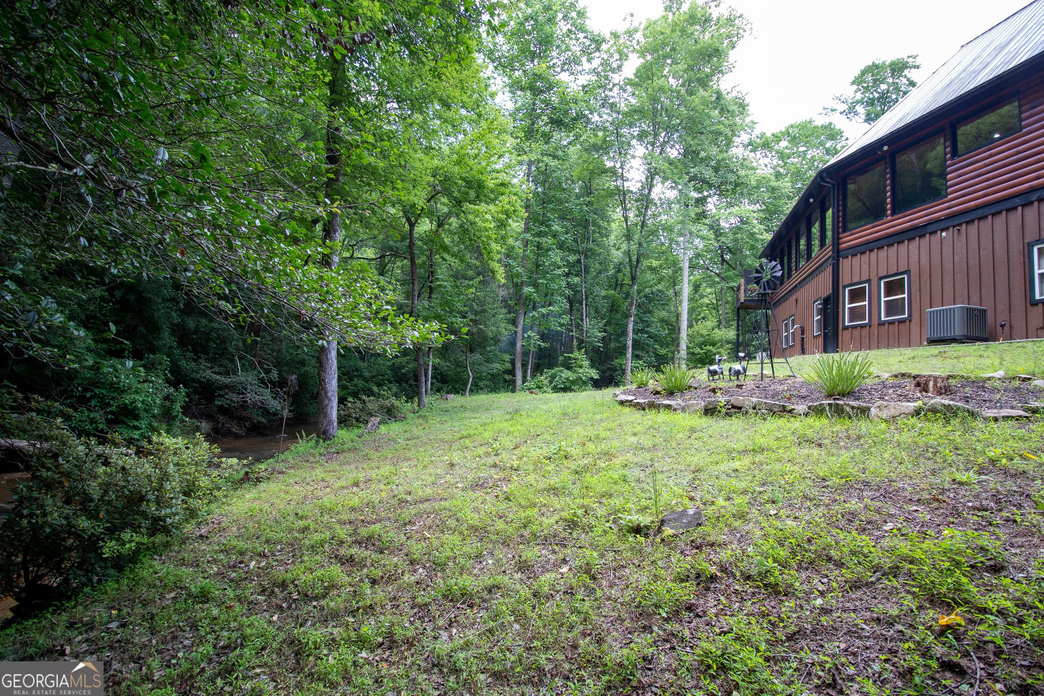 4 bedroom, 4.5 bathroom, 5,153 sq ft cabin,single family residence for sale at 312 Learh Lane, Ellijay, GA 30540 — photo 6