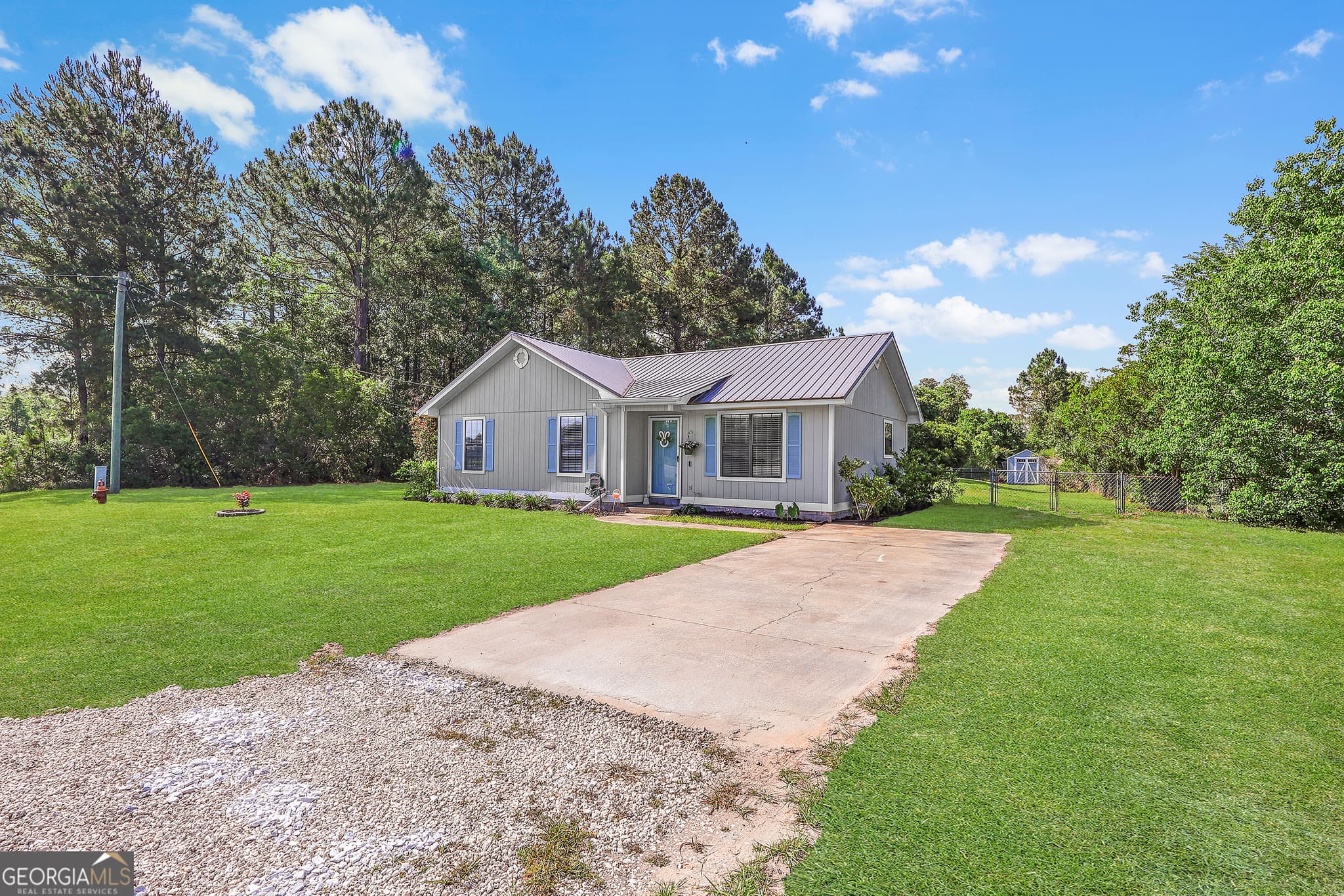 3 bedroom, 2 bathroom, 1,032 sq ft single family residence for sale at 1692 NE Lee Place, Ludowici, GA 31316 — photo 2