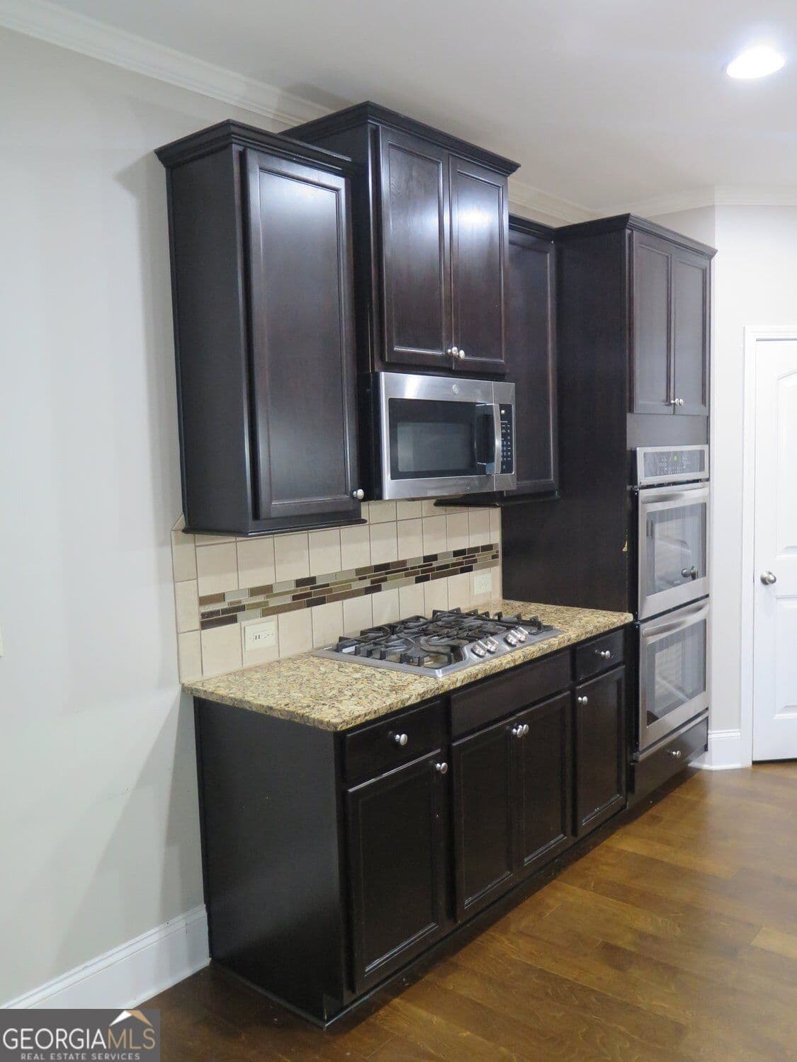5 bedroom, 3 bathroom, 2,885 sq ft single family residence for sale at 536 Wolf Pack Lane, Atlanta, GA 30349 — photo 7
