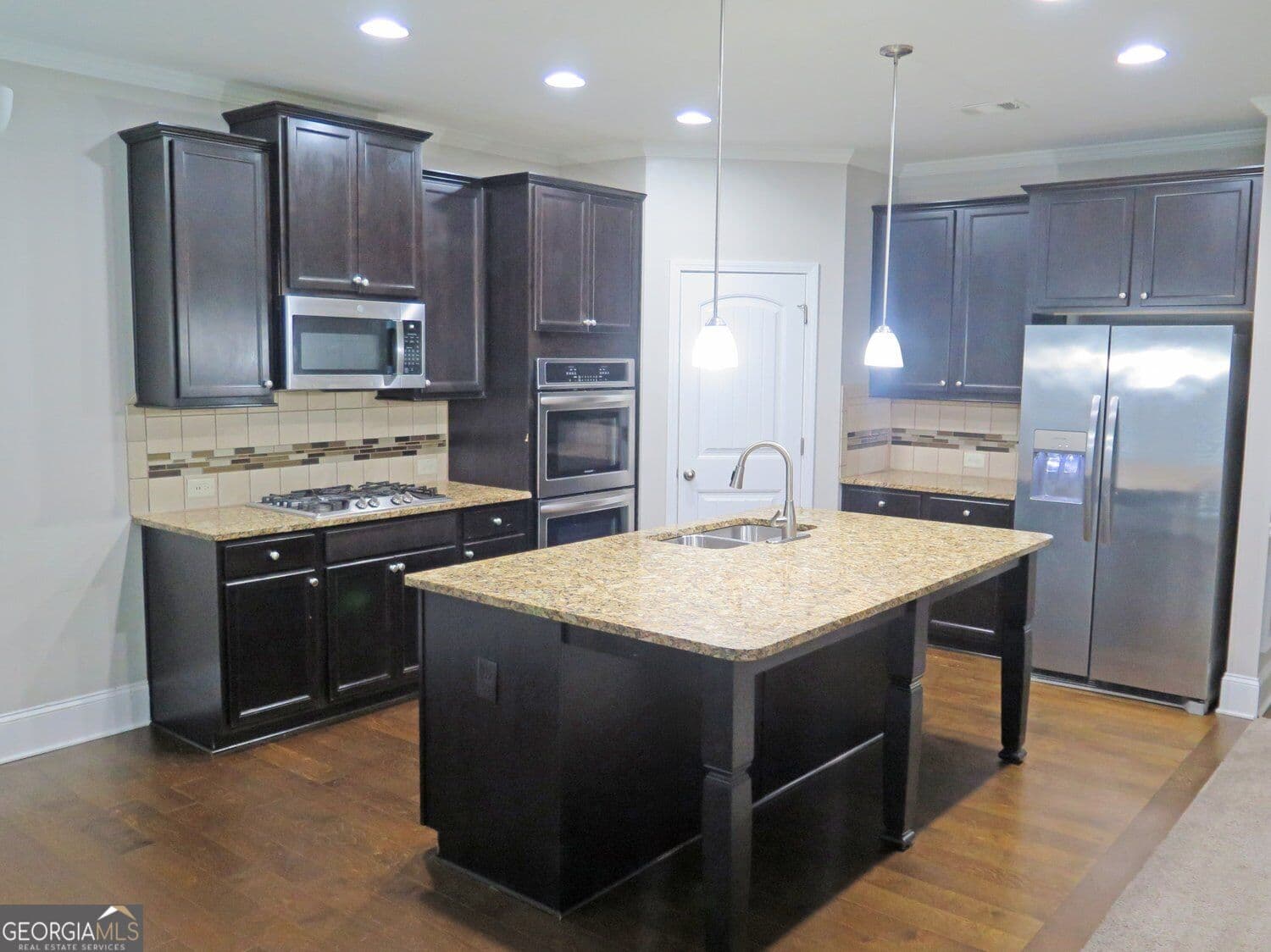 5 bedroom, 3 bathroom, 2,885 sq ft single family residence for sale at 536 Wolf Pack Lane, Atlanta, GA 30349 — photo 9