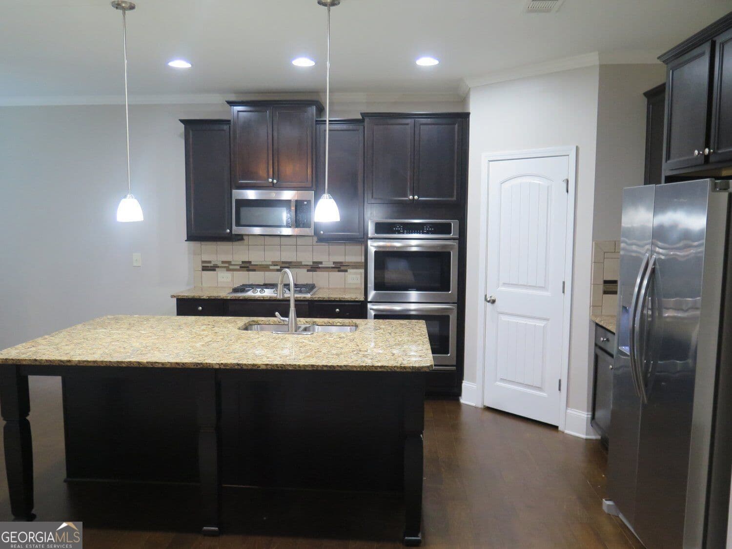 5 bedroom, 3 bathroom, 2,885 sq ft single family residence for sale at 536 Wolf Pack Lane, Atlanta, GA 30349 — photo 8