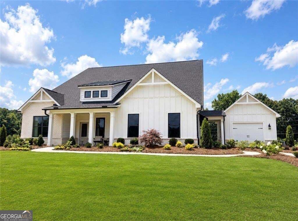 4 bedroom, 3.5 bathroom, 3,495 sq ft single family residence for sale at 8545 Oak Hollow Way, Cumming, GA 30041 — photo 2