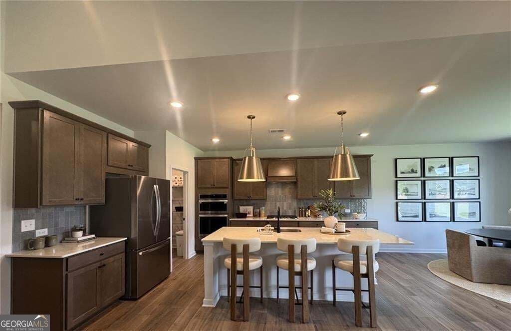 4 bedroom, 3.5 bathroom, 3,495 sq ft single family residence for sale at 8545 Oak Hollow Way, Cumming, GA 30041 — photo 6