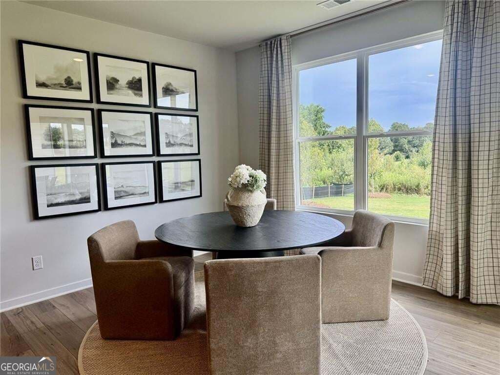 4 bedroom, 3.5 bathroom, 3,495 sq ft single family residence for sale at 8545 Oak Hollow Way, Cumming, GA 30041 — photo 7