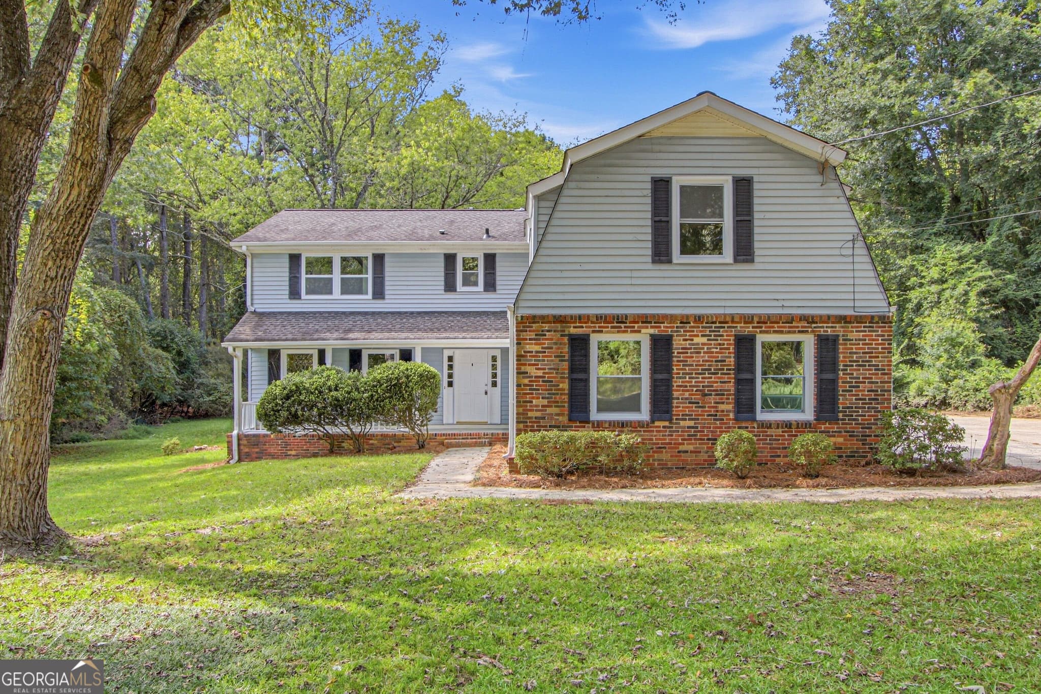 4 bedroom, 1.5 bathroom, 3,051 sq ft single family residence for sale at 2215 Angela Drive, Lilburn, GA 30047 — photo 1 of 43