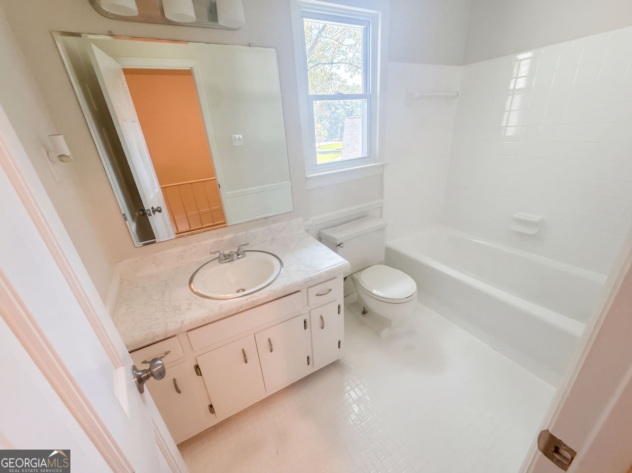4 bedroom, 1.5 bathroom, 3,051 sq ft single family residence for sale at 2215 Angela Drive, Lilburn, GA 30047 — photo 9