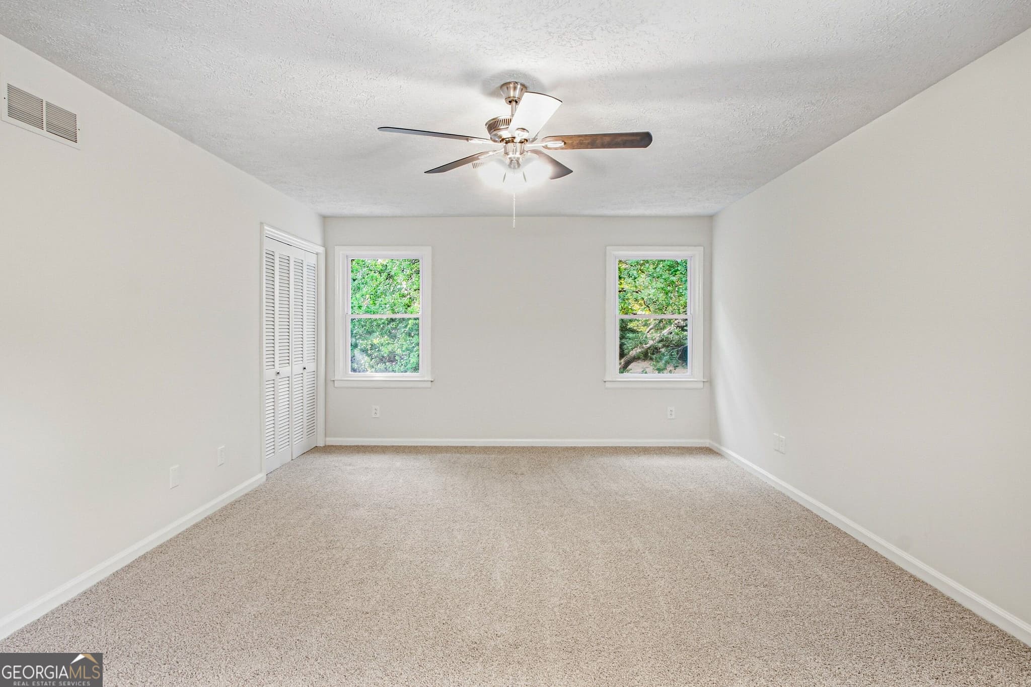 4 bedroom, 1.5 bathroom, 3,051 sq ft single family residence for sale at 2215 Angela Drive, Lilburn, GA 30047 — photo 4