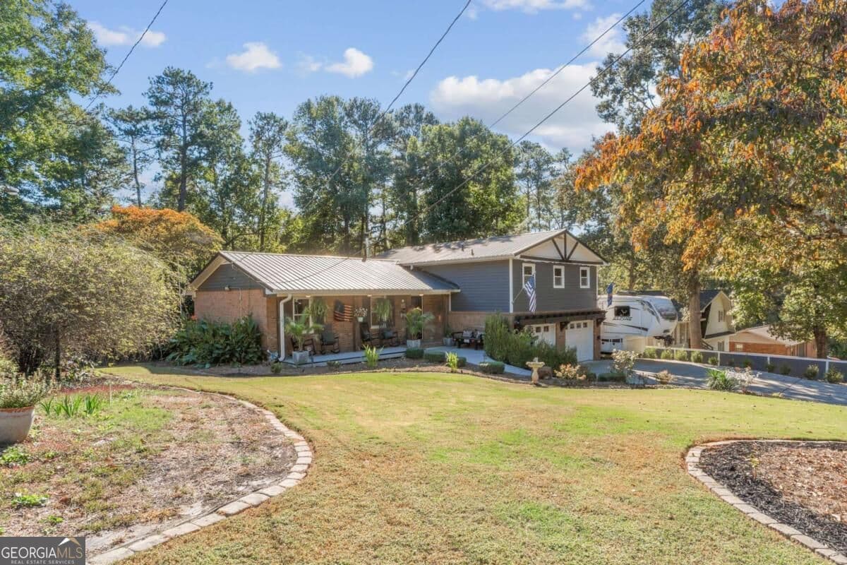 4 bedroom, 3.5 bathroom single family residence for sale at 2501 Due West Circle, Kennesaw, GA 30152 — photo 2