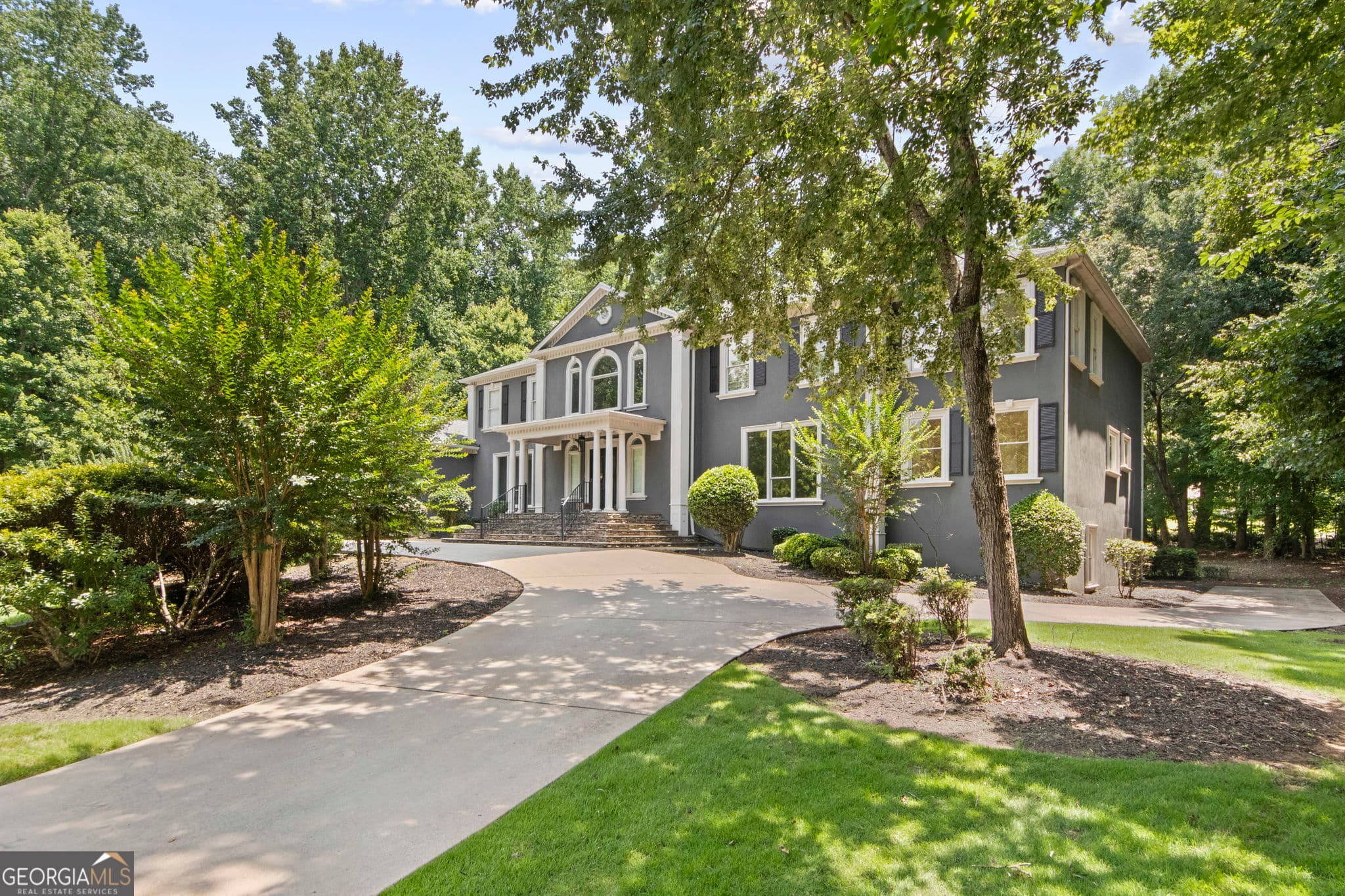 7 bedroom, 7.5 bathroom, 13,261 sq ft single family residence for sale at 335 Birkdale Drive, Fayetteville, GA 30215 — photo 2