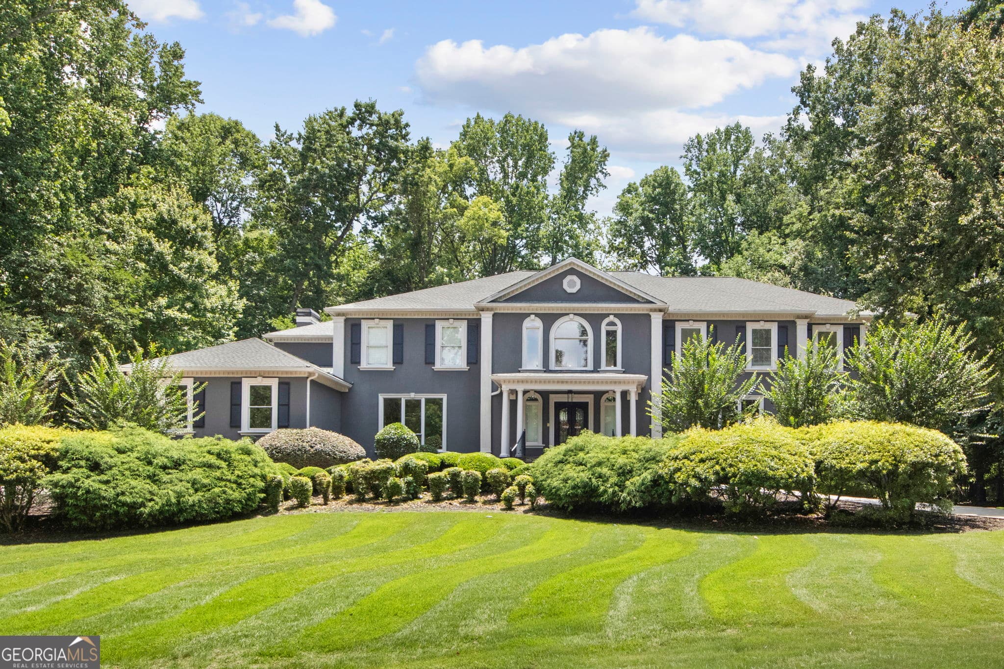 7 bedroom, 7.5 bathroom, 13,261 sq ft single family residence for sale at 335 Birkdale Drive, Fayetteville, GA 30215 — photo 1 of 84