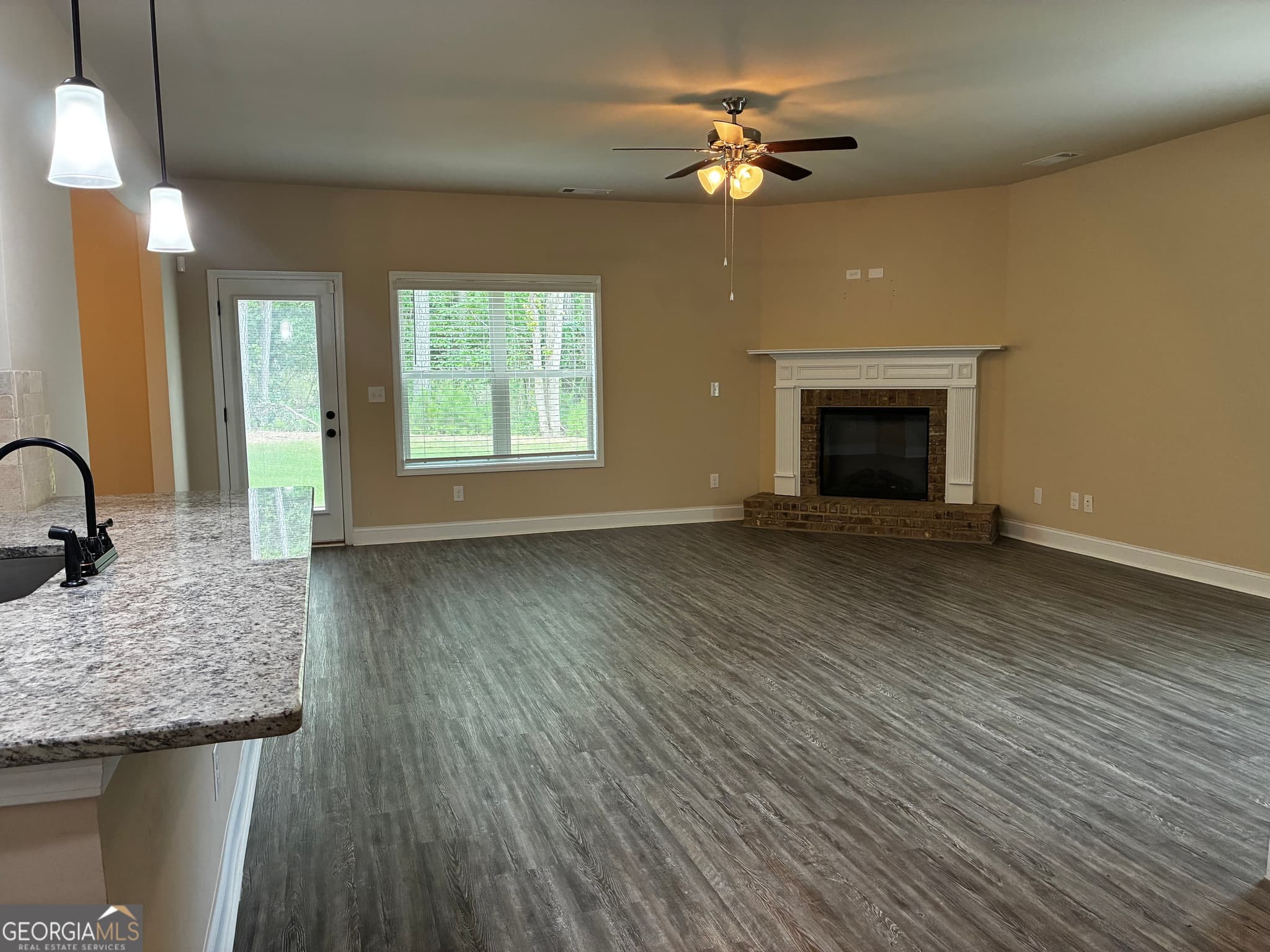 4 bedroom, 2.5 bathroom, 2,409 sq ft single family residence for sale at 109 Armory Creek Drive, Jackson, GA 30233 — photo 3