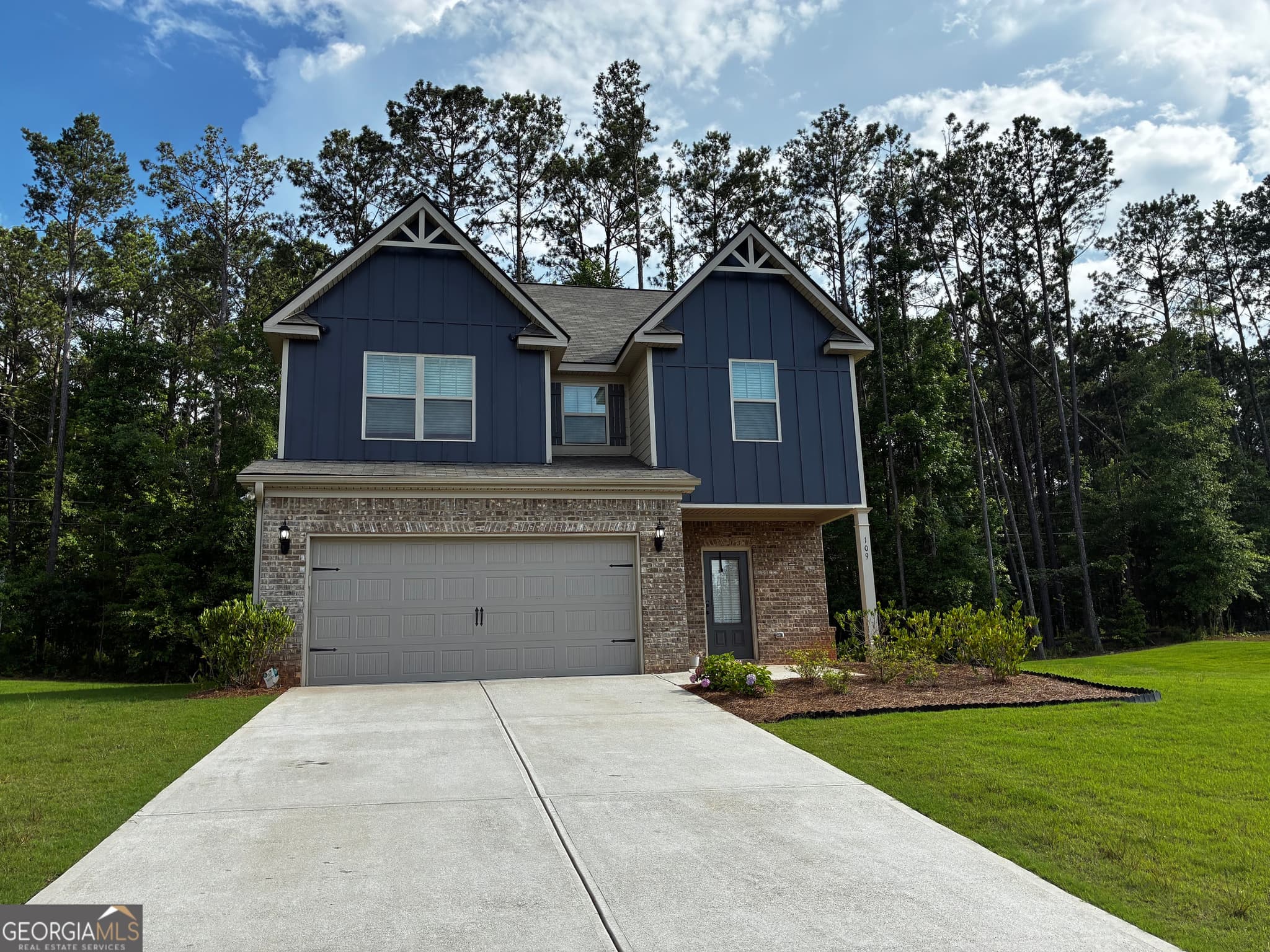 4 bedroom, 2.5 bathroom, 2,409 sq ft single family residence for sale at 109 Armory Creek Drive, Jackson, GA 30233 — photo 1 of 18