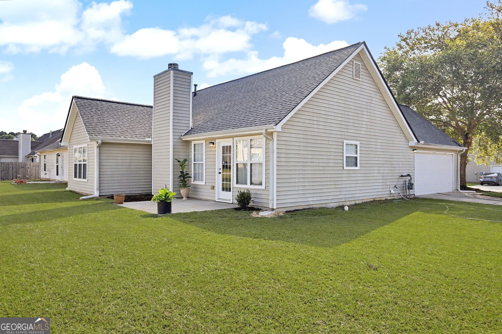 3 bedroom, 2 bathroom, 1,412 sq ft single family residence for sale at 6000 Preserve Pass, Fairburn, GA 30213 — photo 5