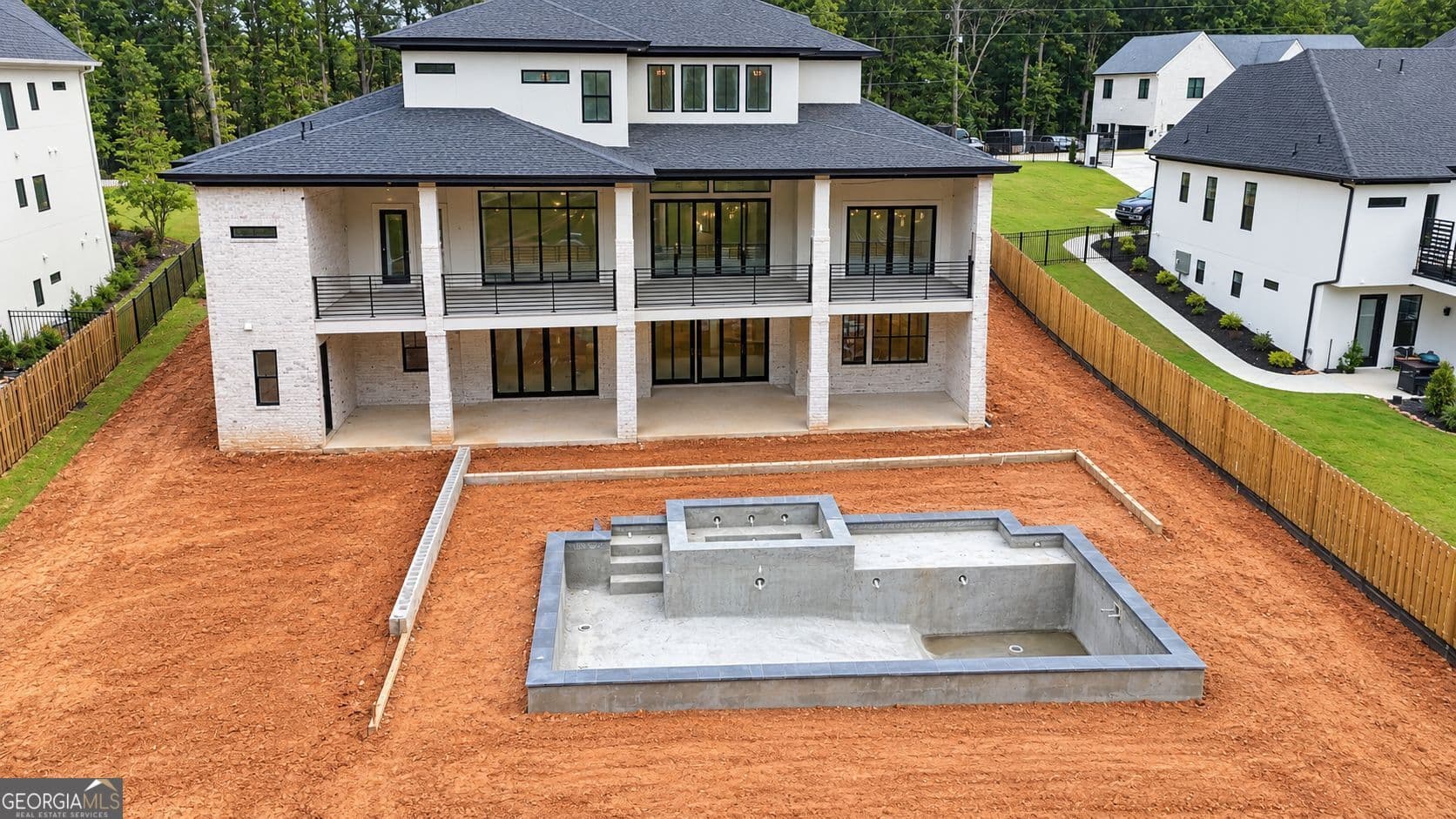 4 bedroom, 6.5 bathroom, 5,200 sq ft single family residence for sale at 6990 Deaton Henry Road, Flowery Branch, GA 30542 — photo 3