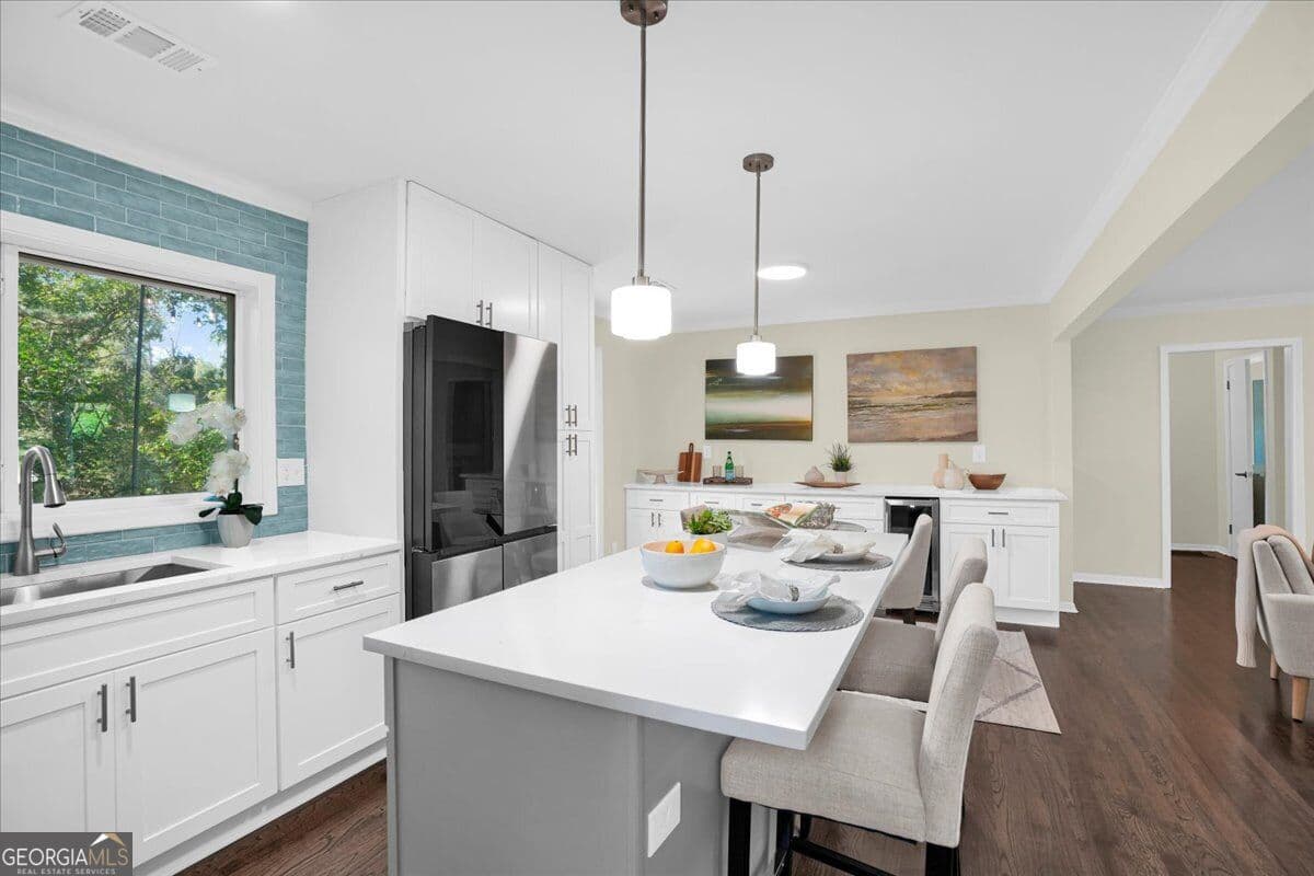 5 bedroom, 3.5 bathroom, 2,437 sq ft single family residence for sale at 2274 Burch Circle, Atlanta, GA 30319 — photo 6