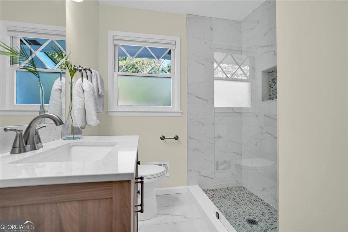 5 bedroom, 3.5 bathroom, 2,437 sq ft single family residence for sale at 2274 Burch Circle, Atlanta, GA 30319 — photo 8