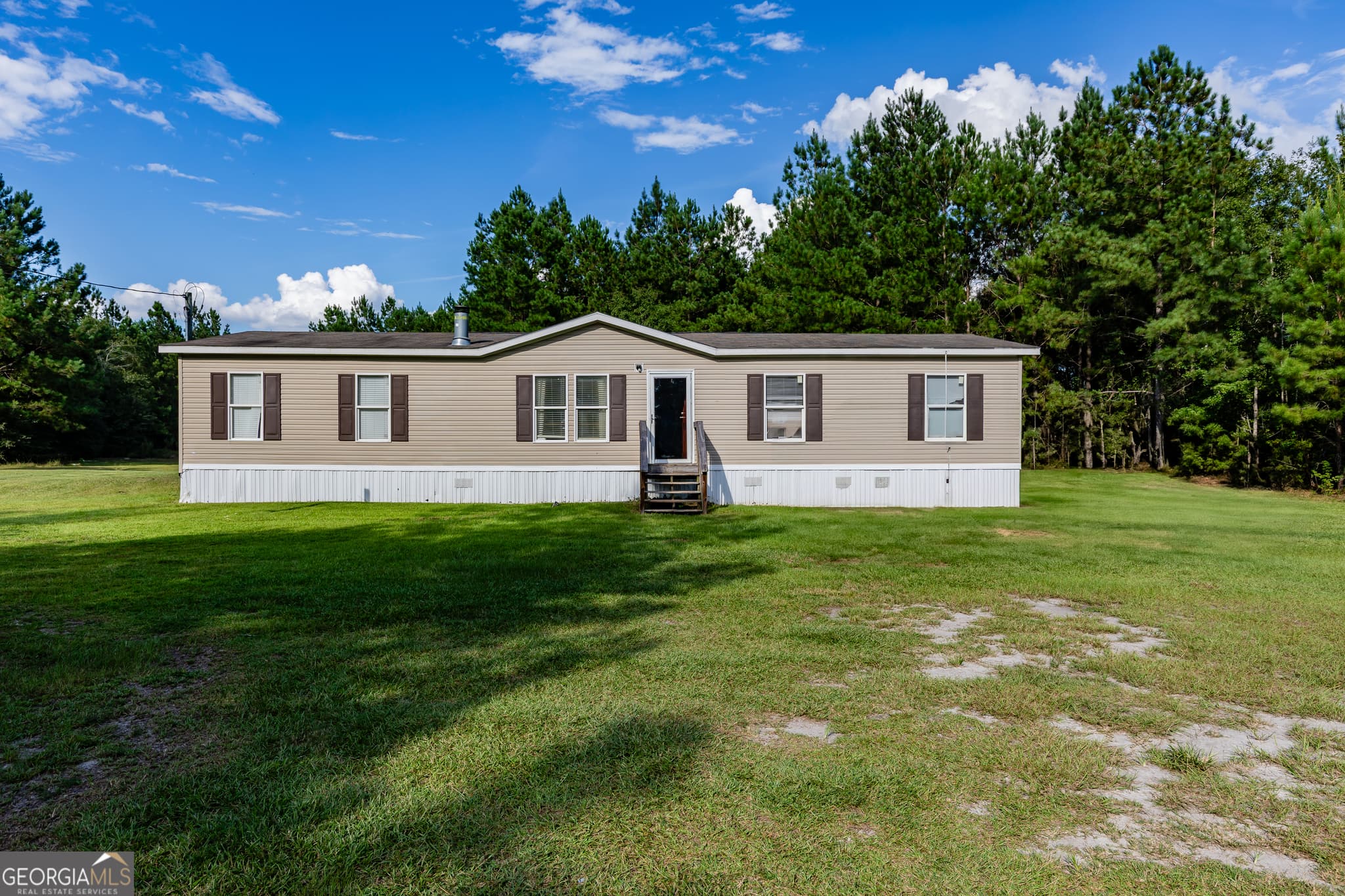 4 bedroom, 3 bathroom, 1,674 sq ft manufactured home,mobile home sold at 4220 Otter Hole Branch Road, Pembroke, GA 31321