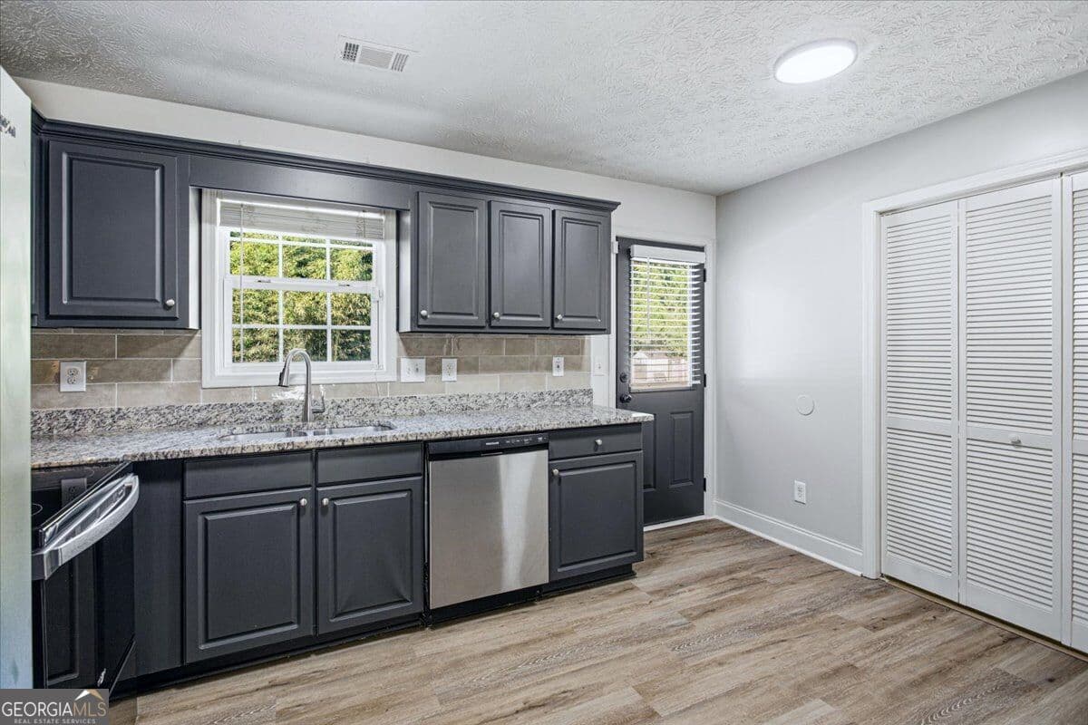 3 bedroom, 2 bathroom, 1,236 sq ft single family residence for sale at 5336 Austell Powder Springs Road, Austell, GA 30106 — photo 9