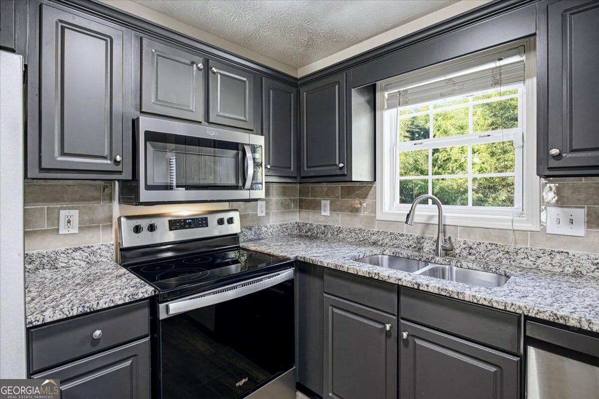 3 bedroom, 2 bathroom, 1,236 sq ft single family residence for sale at 5336 Austell Powder Springs Road, Austell, GA 30106 — photo 10