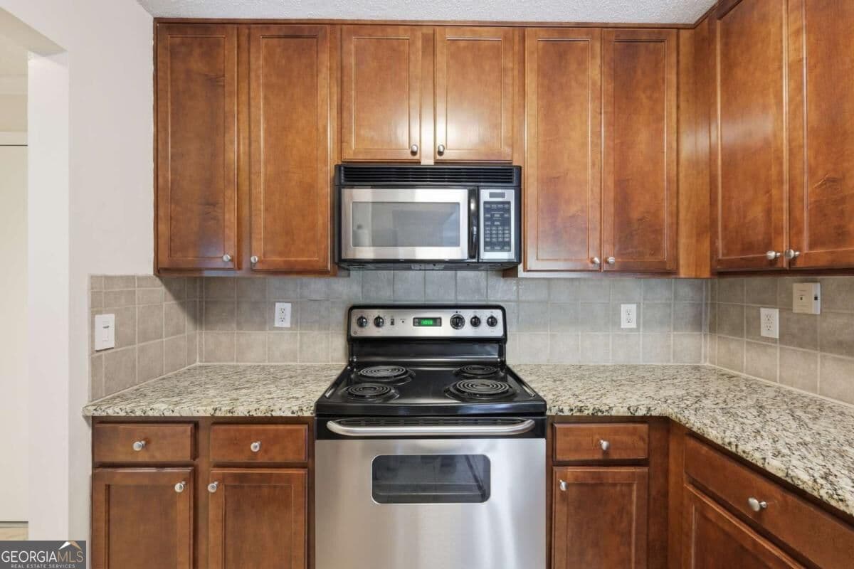 2 bedroom, 1 bathroom, 1,036 sq ft condominium for sale at 3650 Ashford Dunwoody Road 228, Atlanta, GA 30319 — photo 5