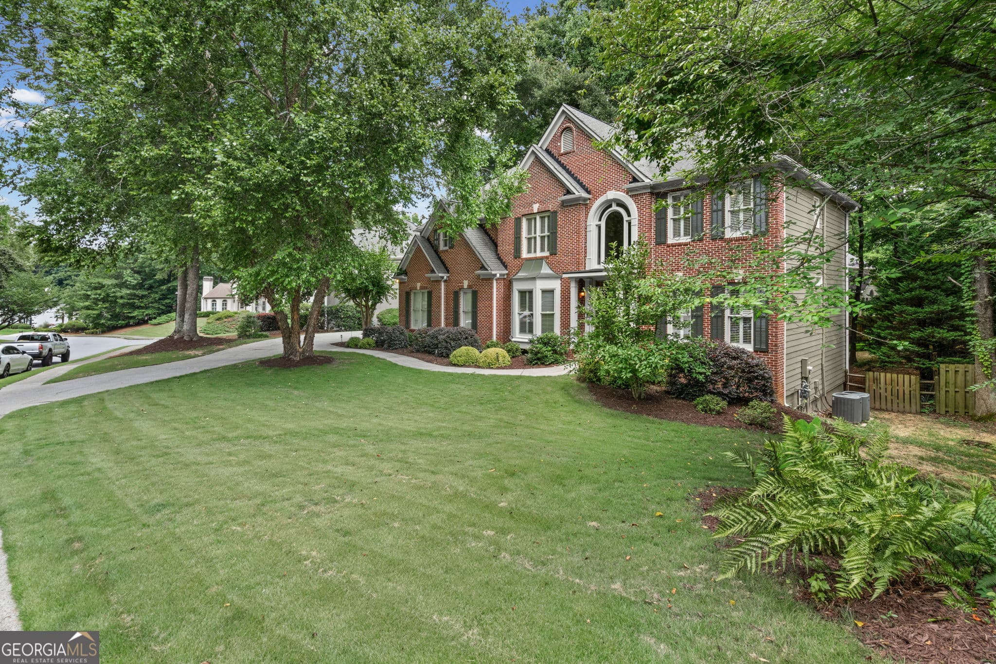 5 bedroom, 4 bathroom, 4,126 sq ft single family residence for sale at 10565 Cauley Creek Drive, Johns Creek, GA 30097 — photo 3