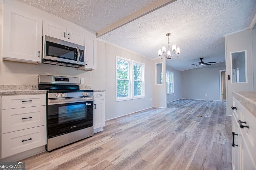4 bedroom, 2 bathroom, 1,440 sq ft single family residence for sale at 61 Crest Road, Carrollton, GA 30116 — photo 6