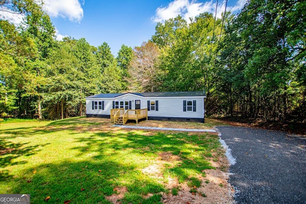 4 bedroom, 2 bathroom, 1,440 sq ft single family residence for sale at 61 Crest Road, Carrollton, GA 30116
