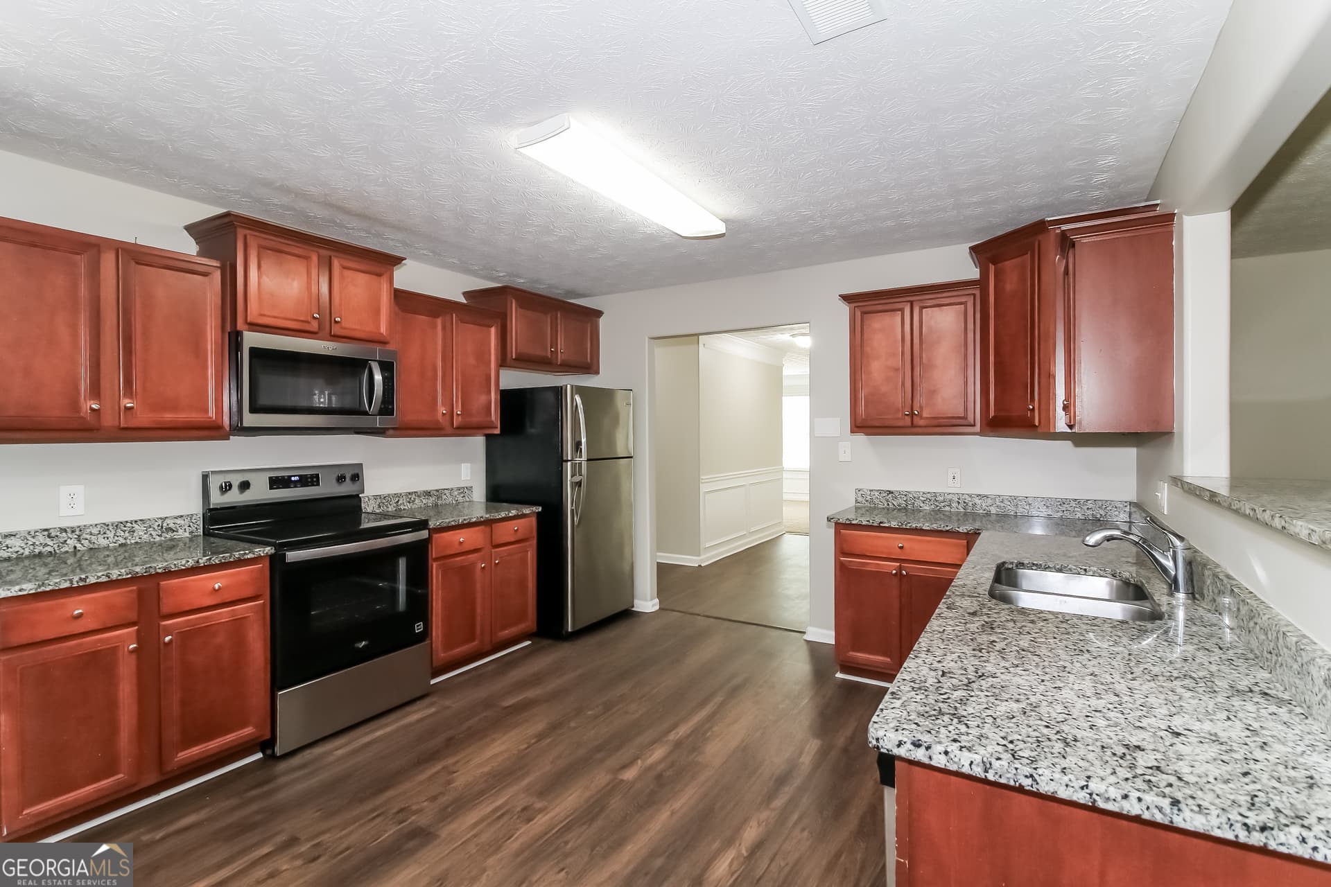5 bedroom, 3 bathroom, 4,489 sq ft single family residence for sale at 7634 Pine Gables Drive, Riverdale, GA 30296 — photo 9