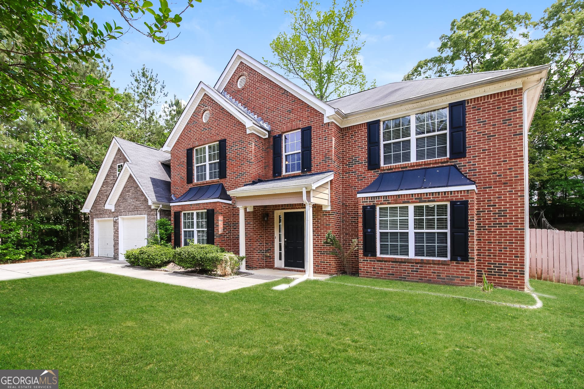 5 bedroom, 3 bathroom, 4,489 sq ft single family residence for sale at 7634 Pine Gables Drive, Riverdale, GA 30296 — photo 4