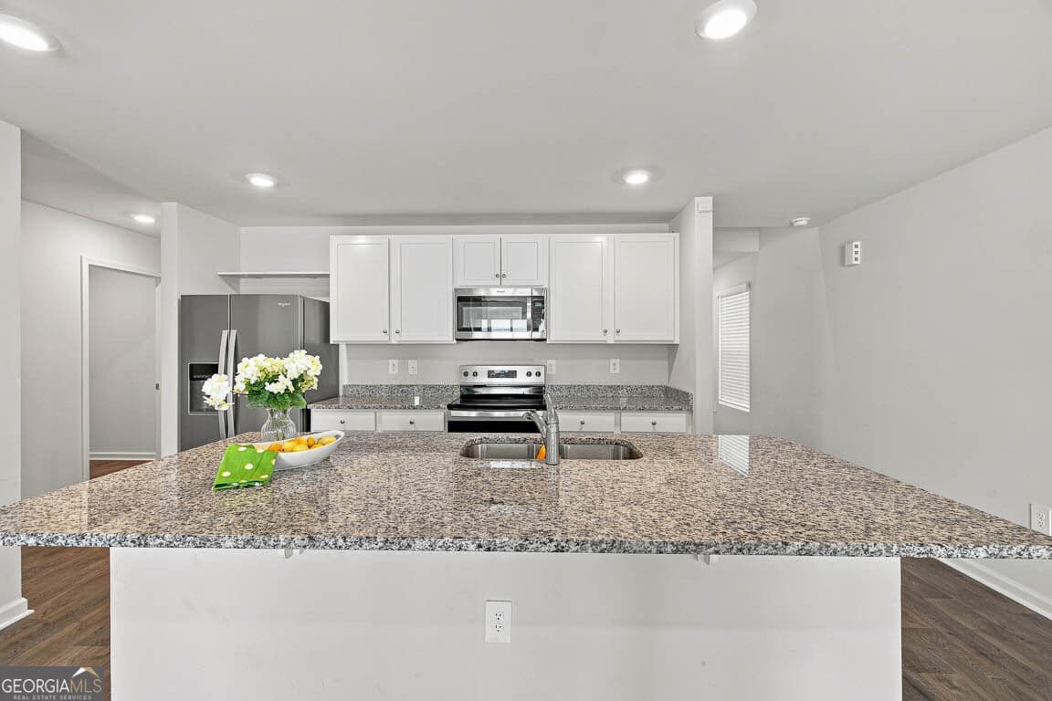 4 bedroom, 2.5 bathroom, 2,605 sq ft single family residence for sale at 66 Autumns Wood Drive, Brunswick, GA 31525 — photo 2