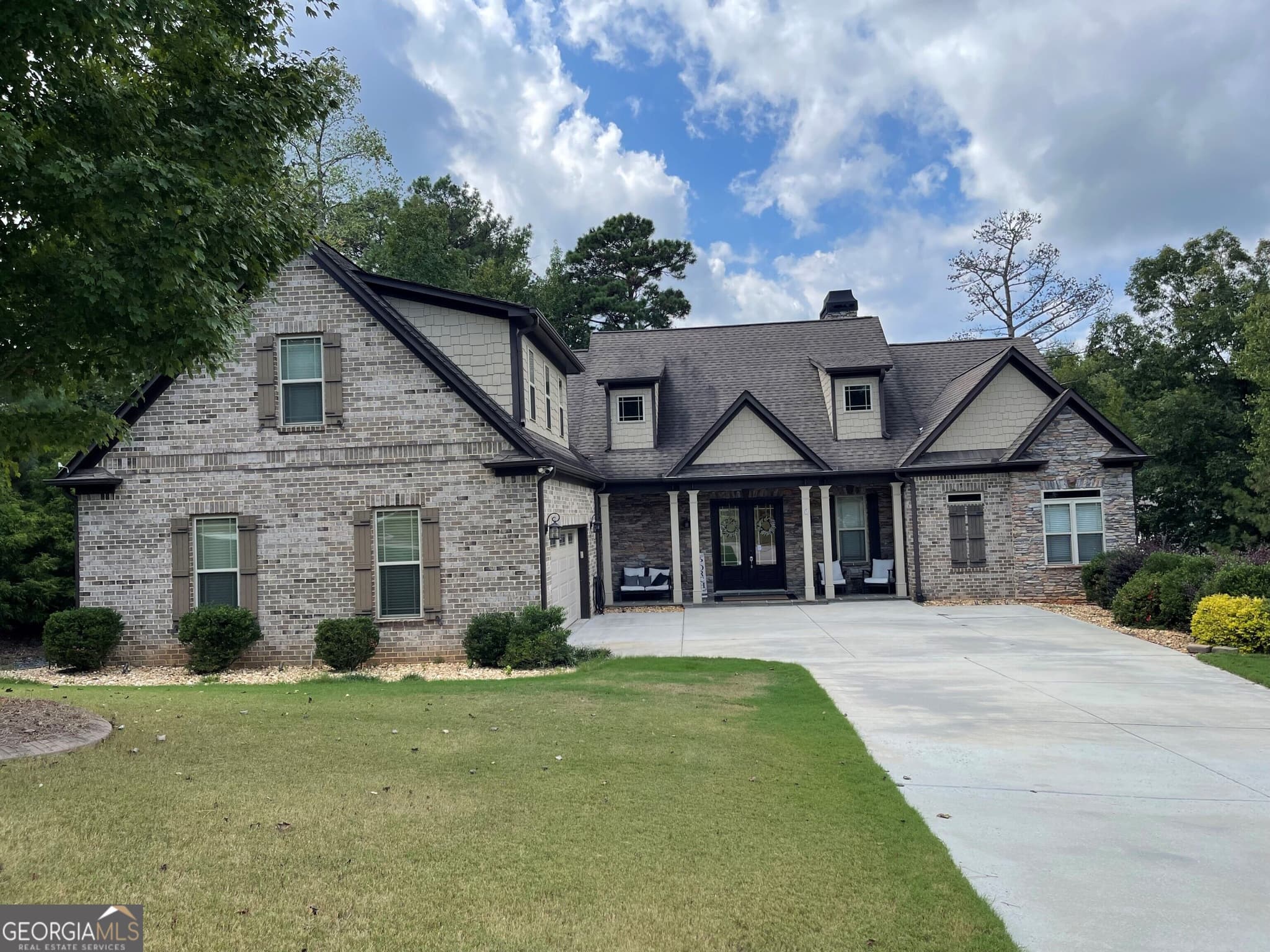5 bedroom, 3.5 bathroom, 4,863 sq ft single family residence for sale at 5818 Wild Herrin Trail, Douglasville, GA 30135 — photo 1 of 41