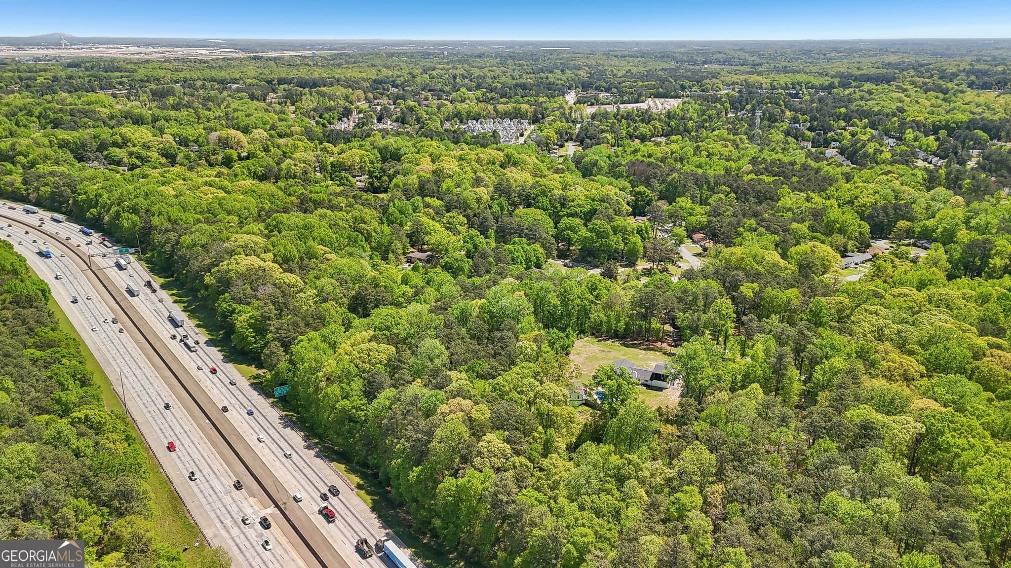 residential lot for sale at 5735 Old Bill Cook Road, Atlanta, GA 30349 — photo 2