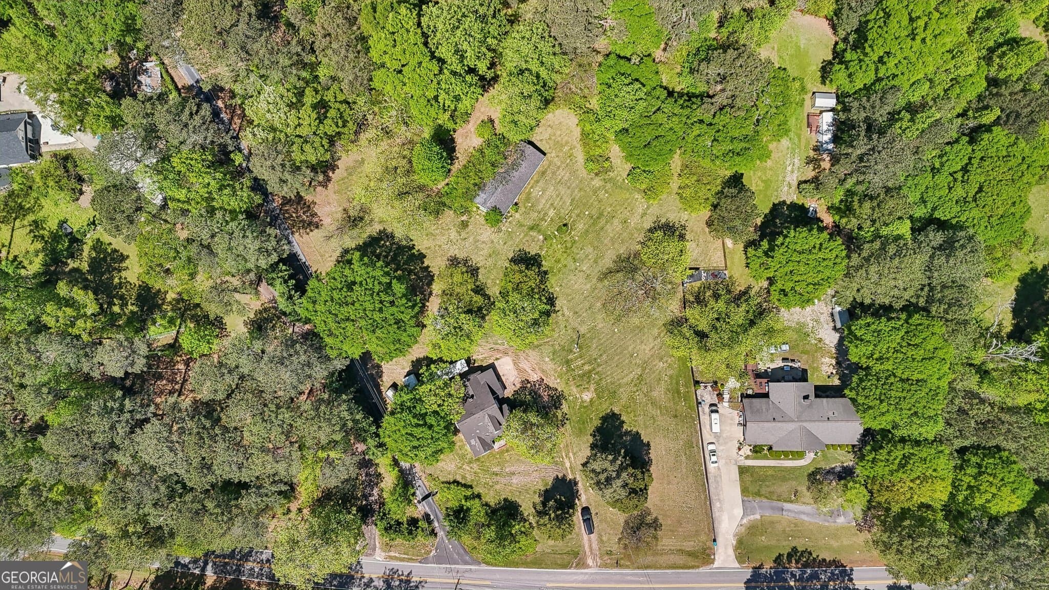 residential lot for sale at 5735 Old Bill Cook Road, Atlanta, GA 30349 — photo 1 of 45