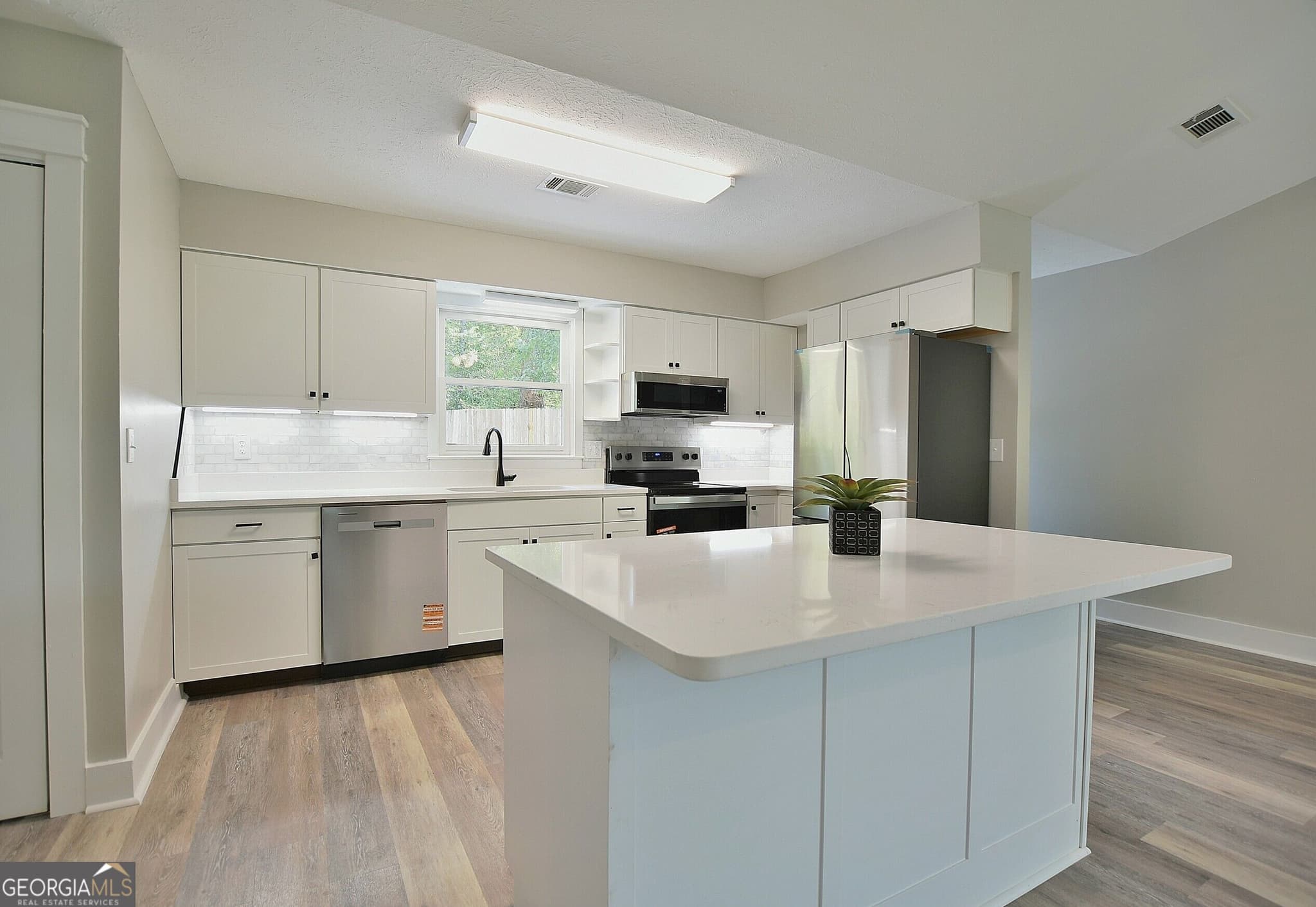 4 bedroom, 2 bathroom, 1,776 sq ft single family residence for sale at 104 Mallard Lane, Fortson, GA 31808 — photo 6