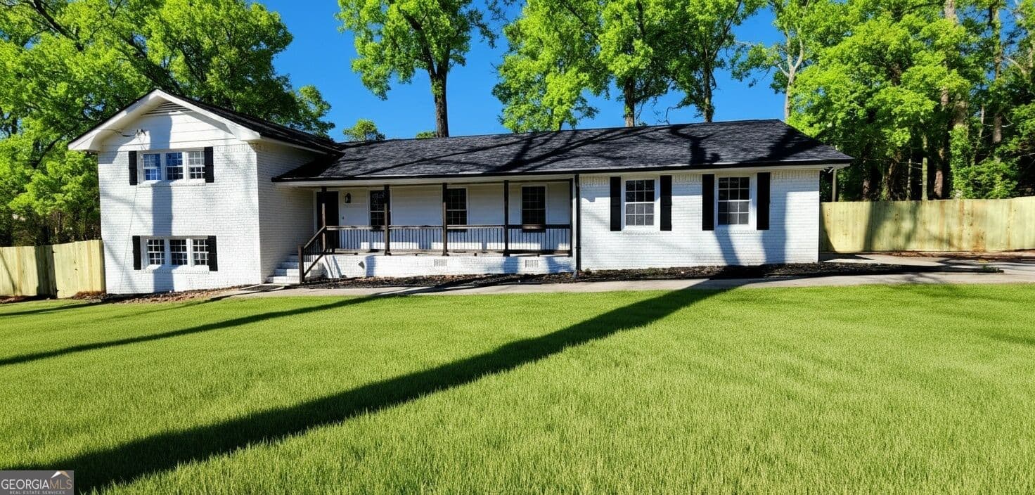 4 bedroom, 2 bathroom, 2,297 sq ft single family residence for rent at 1390 White Oak Street, Conyers, GA 30013 for $2,450 a month — photo 1 of 30