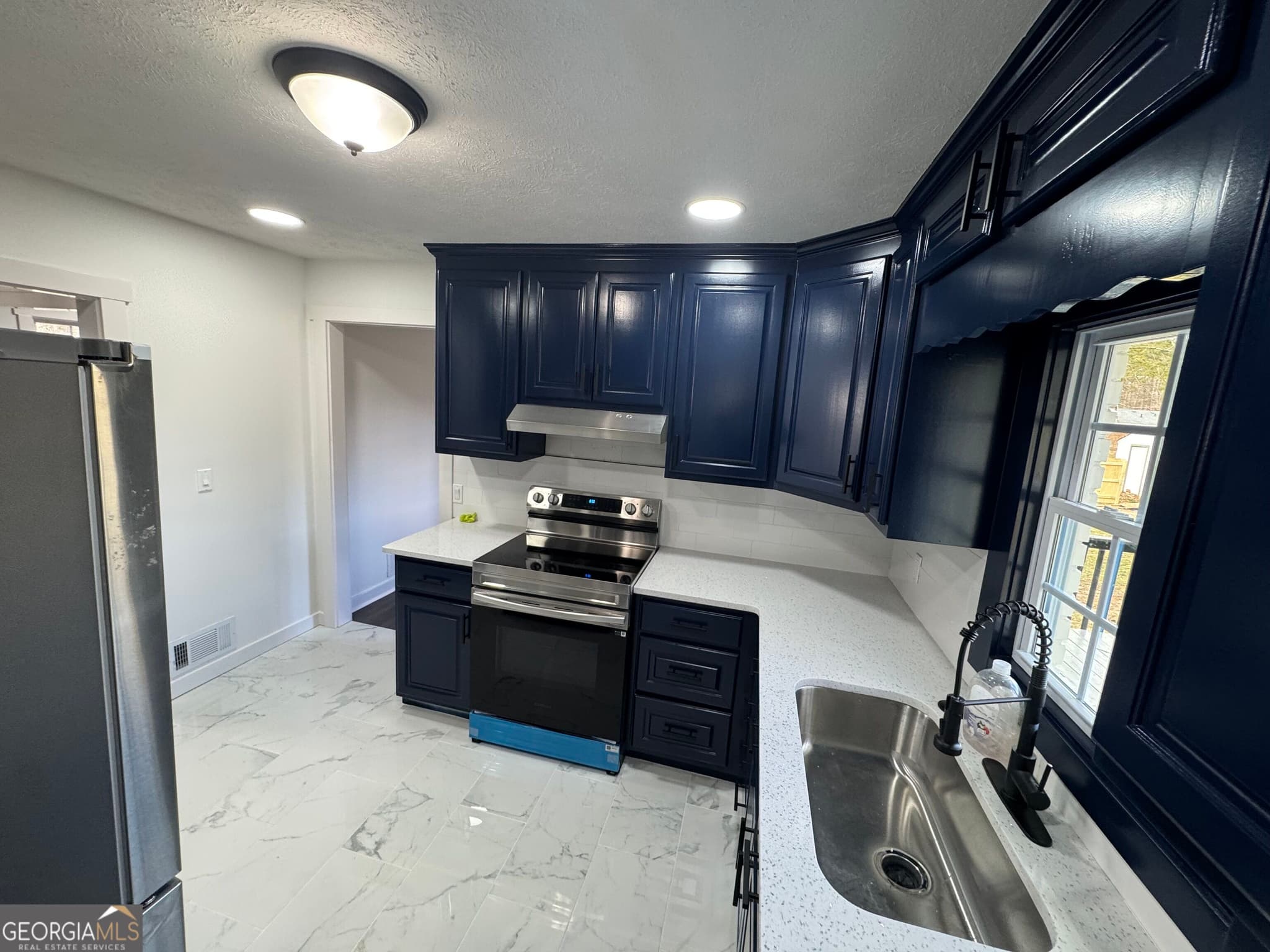 4 bedroom, 2 bathroom, 2,297 sq ft single family residence for rent at 1390 White Oak Street, Conyers, GA 30013 for $2,450 a month — photo 10