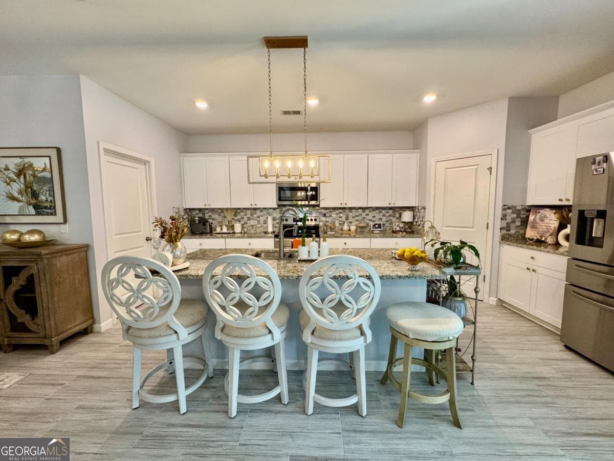 5 bedroom, 2.5 bathroom single family residence for sale at 79 Blue River Court, Pendergrass, GA 30567 — photo 5