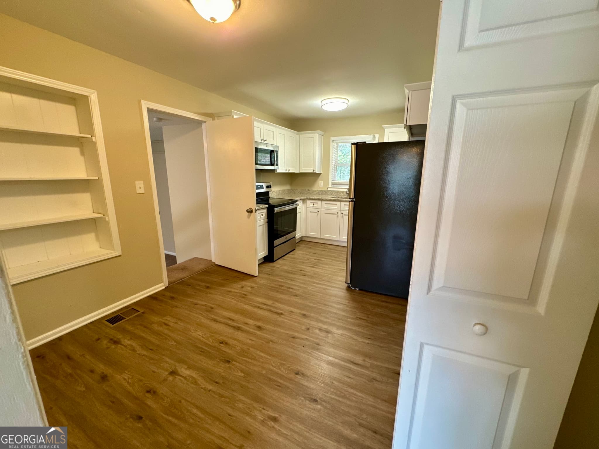 4 bedroom, 1 bathroom, 1,304 sq ft single family residence for sale at 1908 S Columbia Place, Decatur, GA 30032 — photo 5