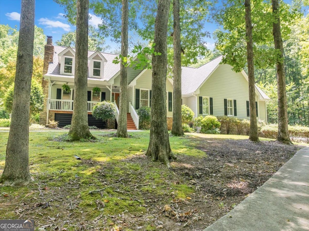 4 bedroom, 3 bathroom, 4,713 sq ft single family residence for sale at 1251 South Trace, Rutledge, GA 30663 — photo 2