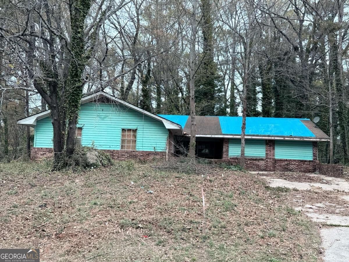 3 bedroom, 1.5 bathroom, 1,654 sq ft single family residence for sale at 2430 Cheryl Lynne Lane, Atlanta, GA 30349 — photo 2
