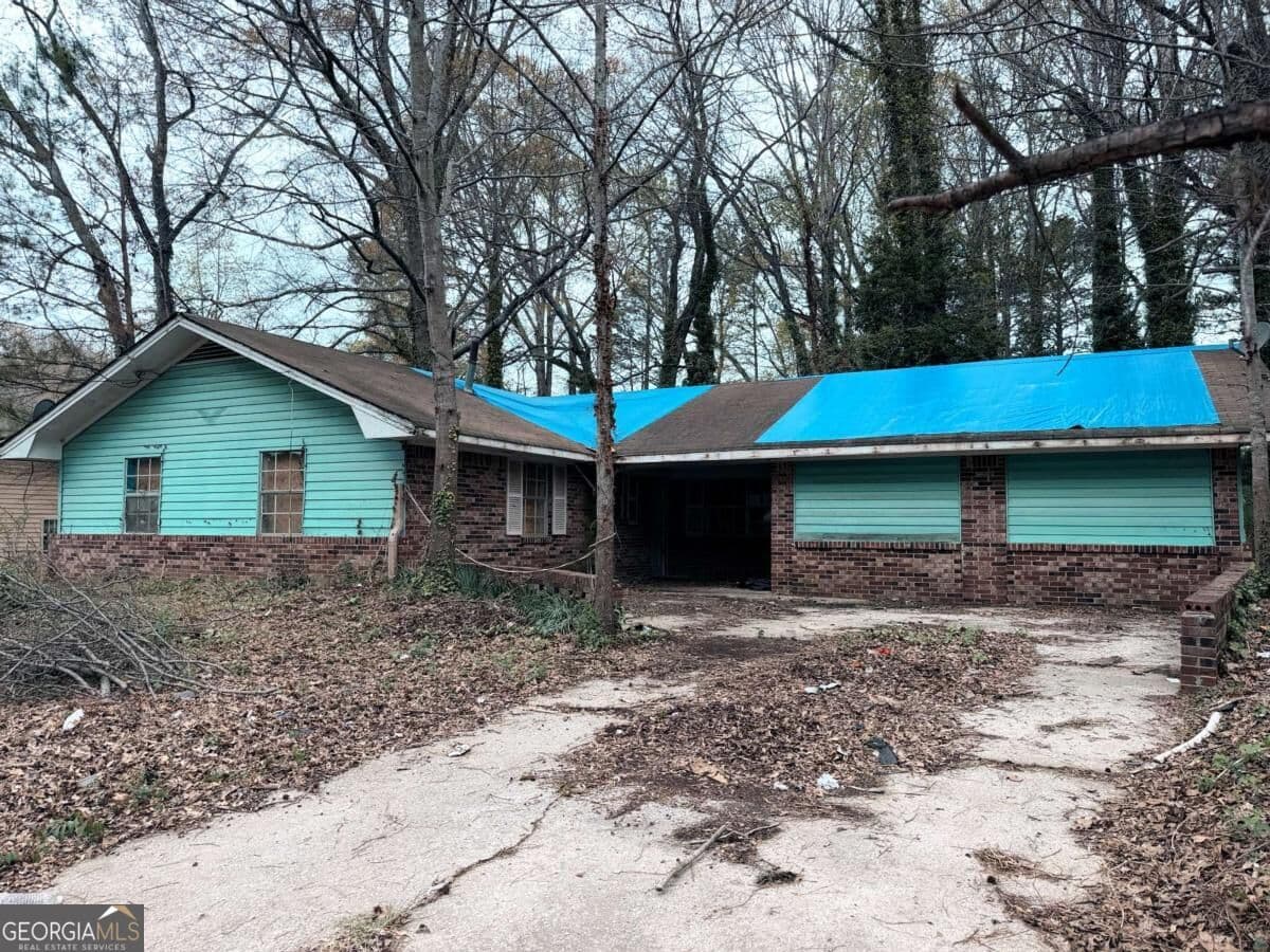 3 bedroom, 1.5 bathroom, 1,654 sq ft single family residence for sale at 2430 Cheryl Lynne Lane, Atlanta, GA 30349 — photo 1 of 20