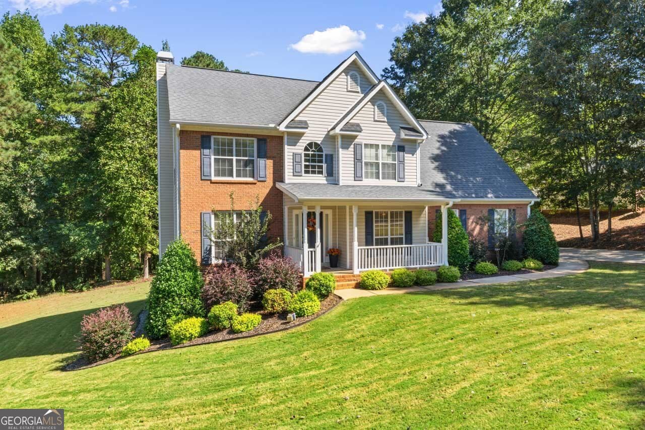 4 bedroom, 2.5 bathroom, 1,989 sq ft single family residence for sale at 1123 River Green Court, Mcdonough, GA 30252 — photo 1 of 32