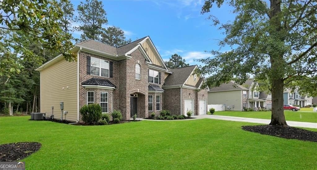 5 bedroom, 4 bathroom, 4,109 sq ft single family residence for sale at 115 Cypress Loop, Bloomingdale, GA 31302 — photo 2