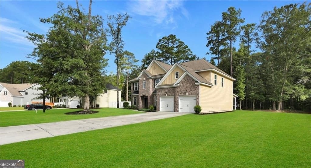 5 bedroom, 4 bathroom, 4,109 sq ft single family residence for sale at 115 Cypress Loop, Bloomingdale, GA 31302 — photo 3
