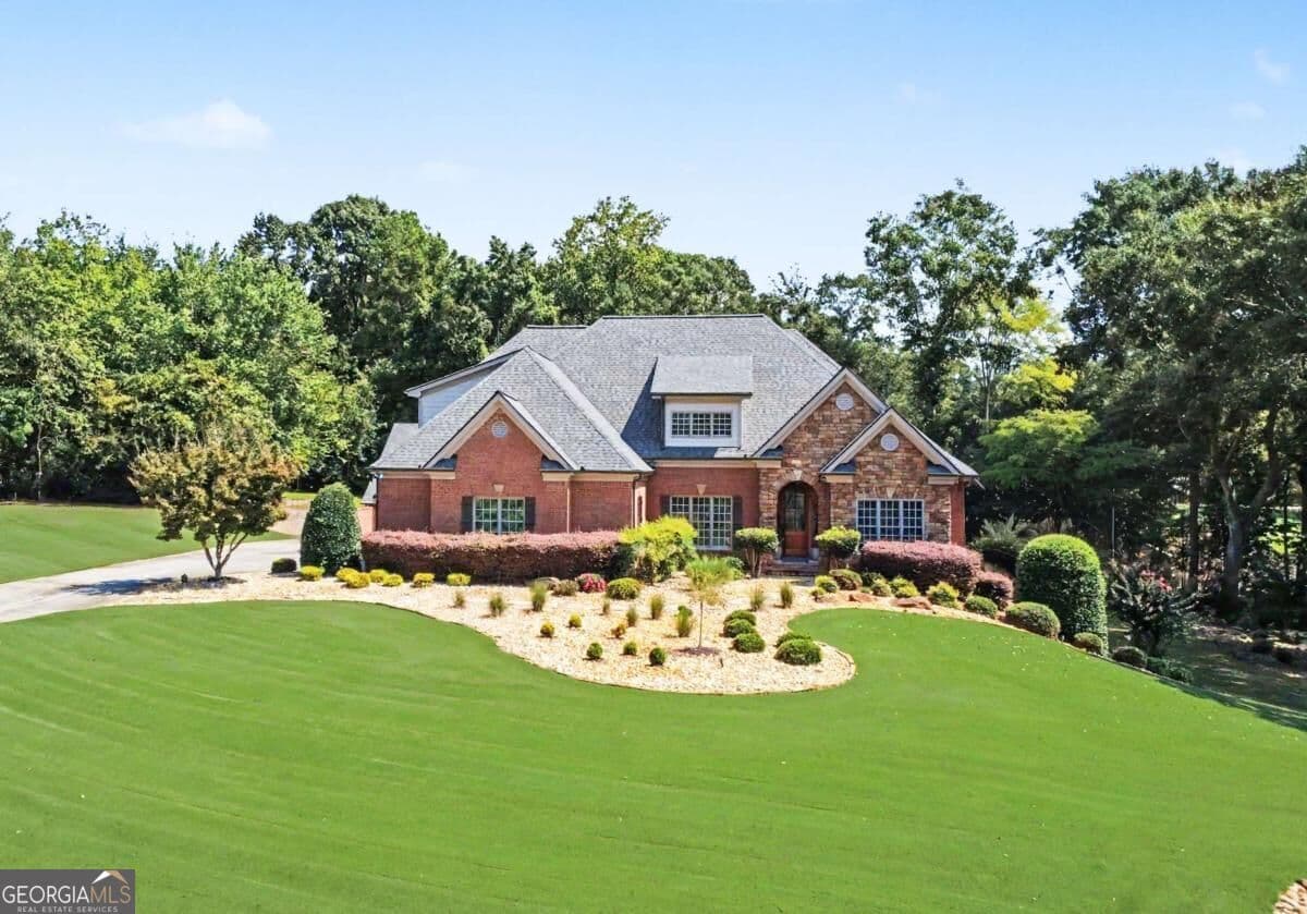 9 bedroom, 6 bathroom, 7,506 sq ft single family residence for sale at 116 River Bend Drive, Hoschton, GA 30548 — photo 1 of 70